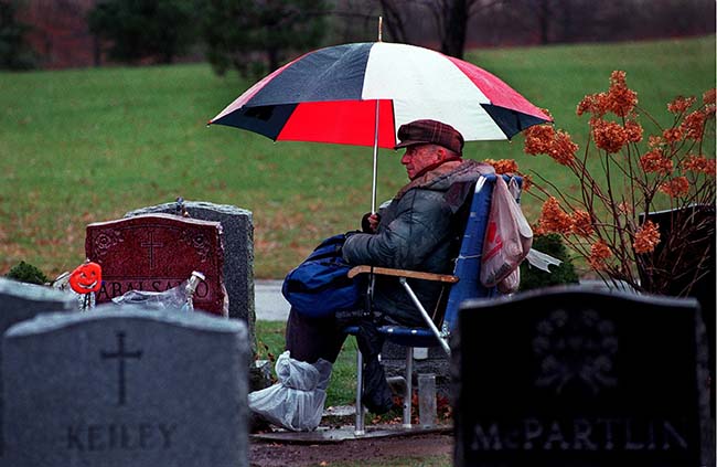 Man Keeps Vigil At Wife’s Grave