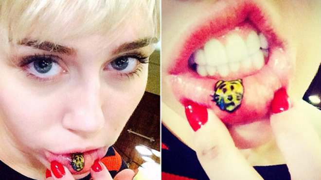 miley-cyrus-lip-tattoo-sad-kitty-thumb-550xauto-78186